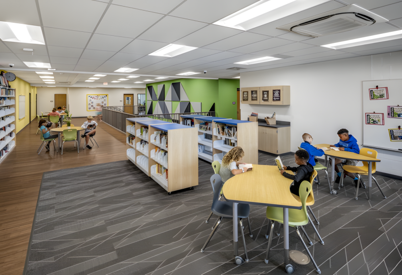 picture of library with students at tables
