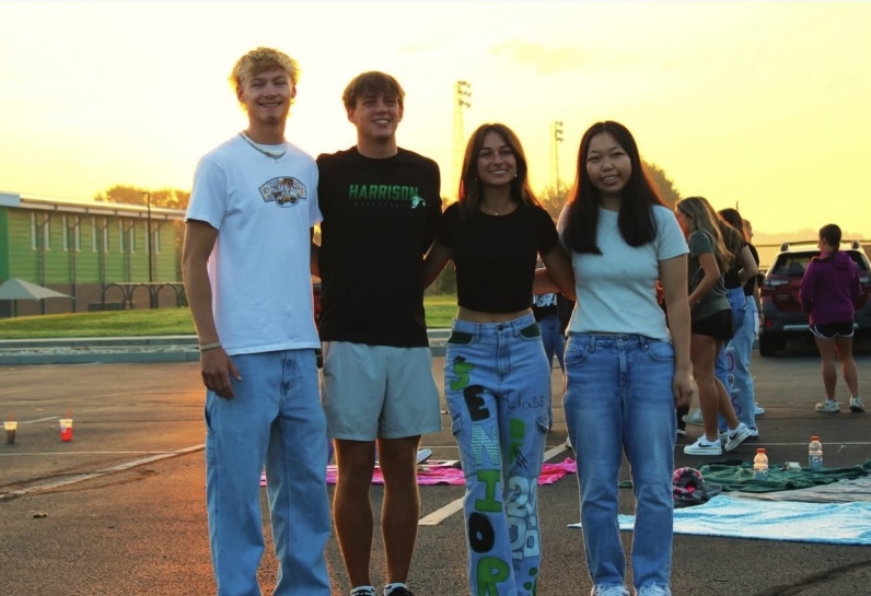 four teens smiling