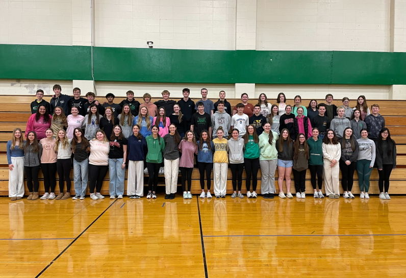 a group of students on bleachers